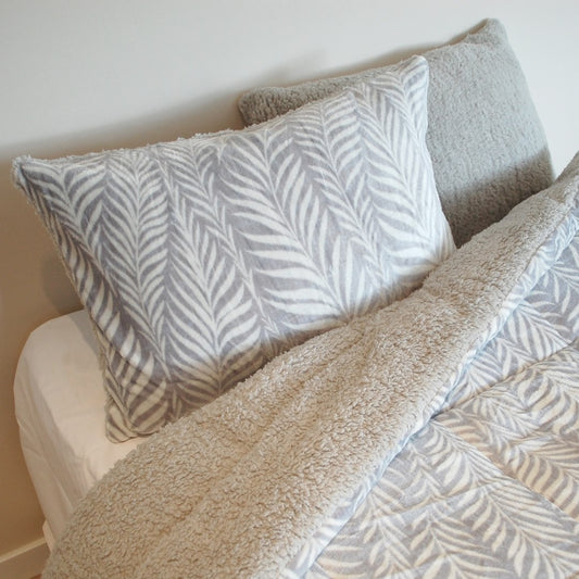 Warm sherpa winter duvet with gray leaf print.