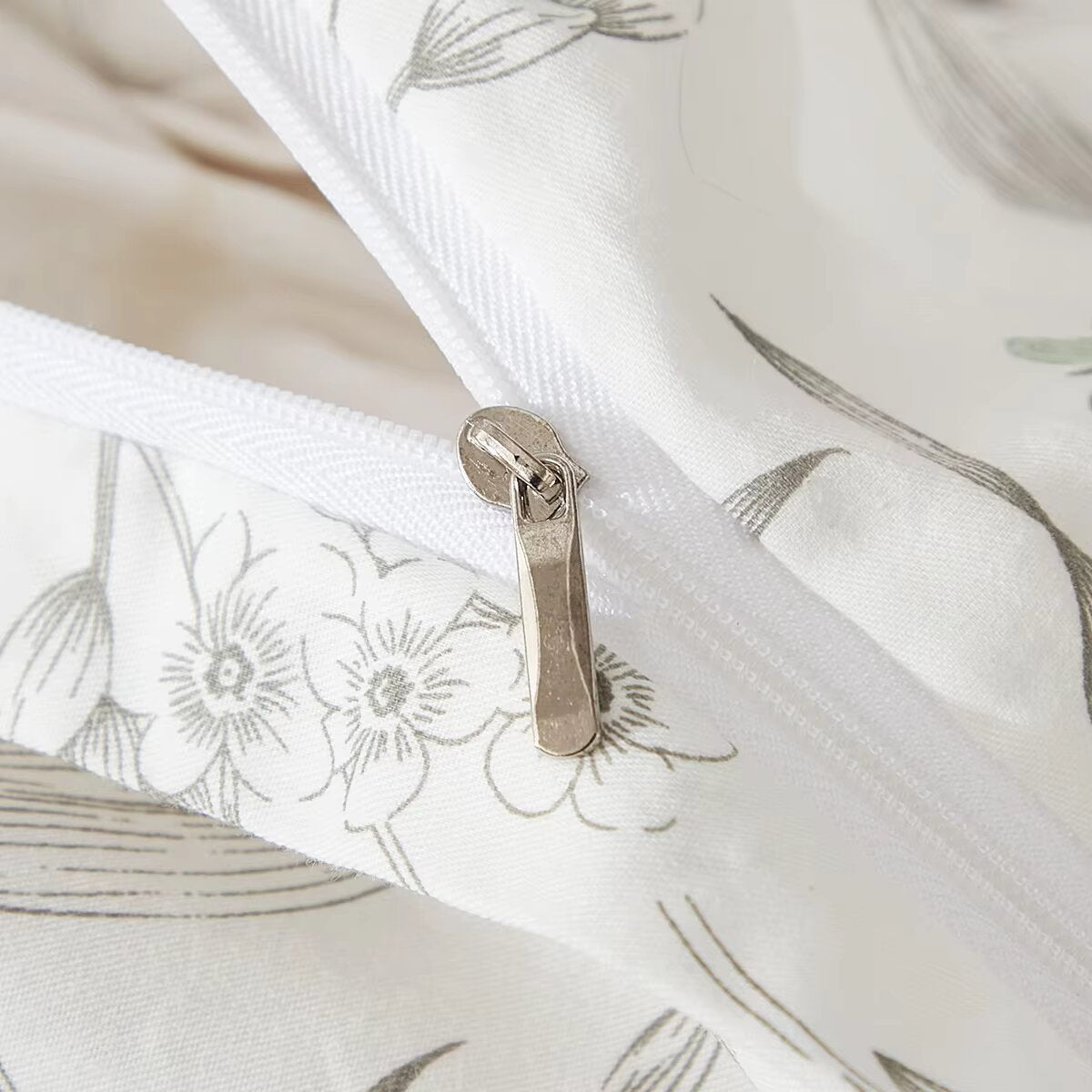 Printed duvet cover with black leaves and pale pink background, extra soft microfiber.